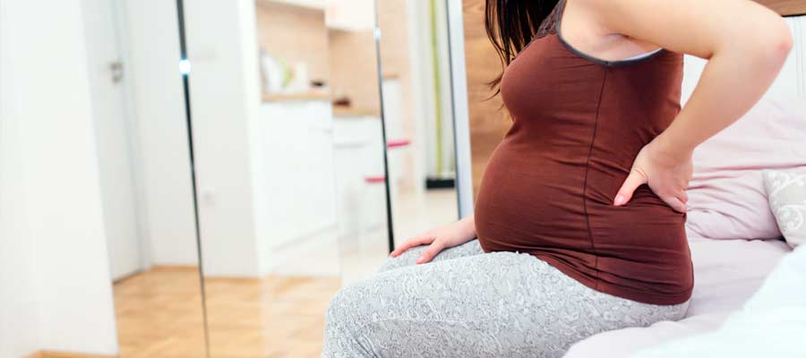 Back pain in pregnancy: Causes, pain relief, and prevention